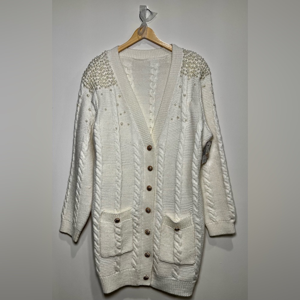 Cable knit sweater dress with pearl detail and gold buttons